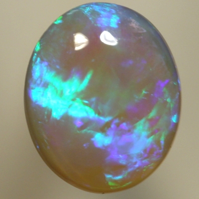 SOLID CRYSTAL OPAL Bright green and turquoise over a purple hue